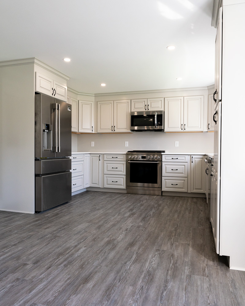 New vinyl flooring and kitchen cabinets