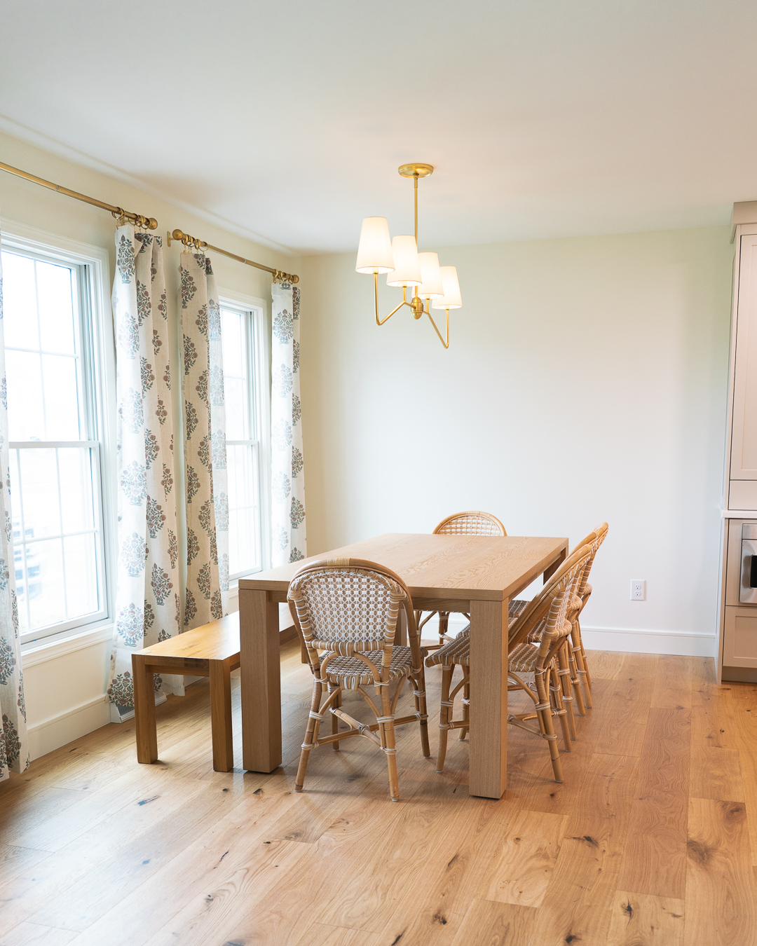 renovated dining room with white oak engineered hardwood floors